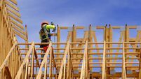 Construction on New Home or Residential Building Wooden Beams and Sky