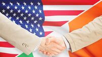Businessmen handshake - United States and Ireland