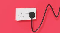 Black power cord connecting an electric plug socket forming a graph with increasing trend on red background. Illustration of the