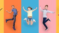 Happy Diverse Kids Jumping Posing Over Different Colorful Backgrounds, Collage