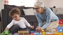 Grandmother playing with her grandson