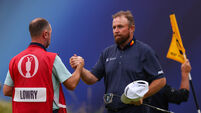 Shane Lowry with Caddie Darren Reynolds after finishing his round 18/7/2025