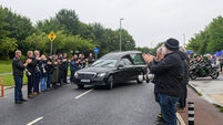 Watch: Funeral of Photographer Michael O'Neill