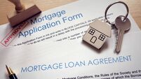 Mortgage application loan agreement and house key