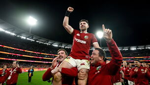 <p>SERIES WINNERS: Winning try scorer Hugo Keenan of British &amp; Irish Lions is lifted by teammates Mack Hansen, left, and Jamie George as they celebrate after the second test match. Pic: Brendan Moran/Sportsfile</p>