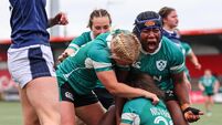 Linda Djougang celebrates Deirbhile Nic a Bháird  scoring her sides fifth try 2/8/2025