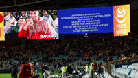 A view of a message on the big screen referencing the break in play due to a lightning and storm warning 2/8/2025