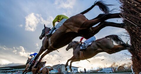 A general view of the runners and riders in  The `Bet Through The Free Racing Post App` Handicap Steeplechase 26/12/2021