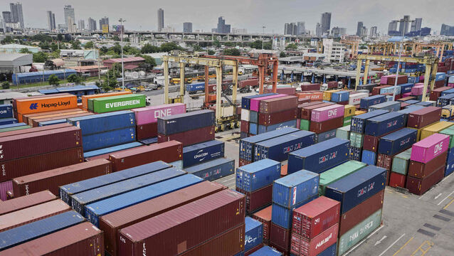 <p>Containers piled up in a cargo terminal at the Bangkok Port in Thailand (Sakchai Lalit/AP)</p>
