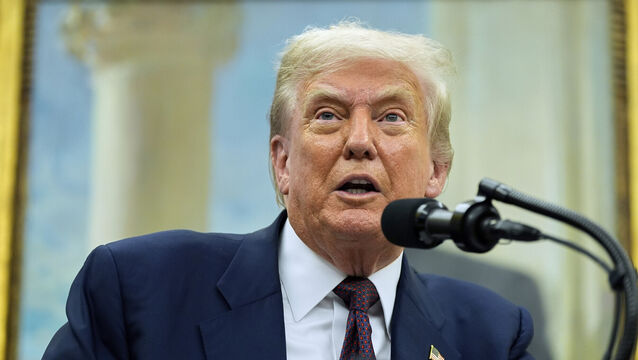 <p>US president Donald Trump in the Oval Office in Washington (Alex Brandon/AP)</p>